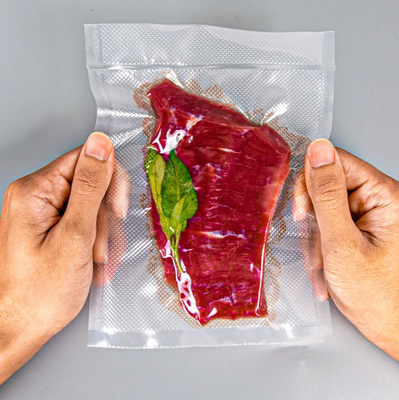 Groothandel Op maat gedrukte compressie vacuümverpakkingszak vacuümverzegelingszak plastic zak voor voedsel