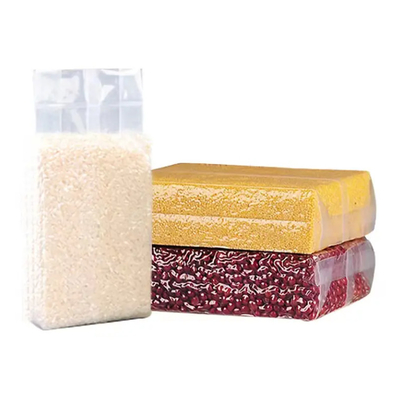 Goedkope doorzichtige nylon plastic verpakkingszak Sterke zijkant gasset afdichting 1 kg/100 kg Vacuümverpakkingszakken voor rijstvoedsel