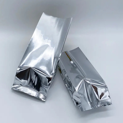 Glanzend zilveren aluminiumfolie gelamineerd hitte afdichting Achterkant afdichting Gusset Voedselverpakkingszak Vacuüm Voedsel thee Koffiebonenzakken