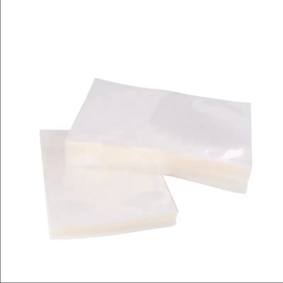 In voorraad en op maat Duidelijk doorzichtig Nylon PE gelamineerd Plastic voedselopslag Verpakkingsruimte Vacuum Sealer zakken