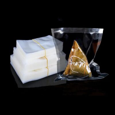 Fabrieksdirecte verkoop van op maat gemaakte driezijdig gesealde nylon voedselverpakkingszakken, zeer transparante vacuüm voedselzakken, PE plastic zakken, 100 stuks